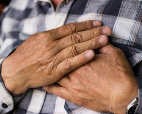 Chest pain caused by asbestosis.